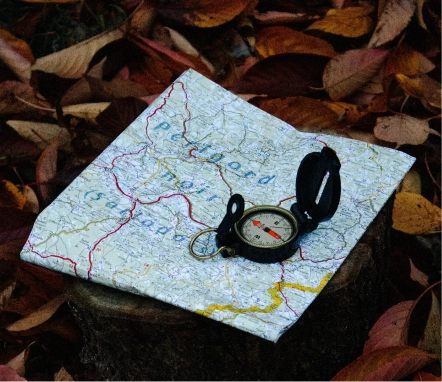 Silva compass laid on an Ordnance Survey map